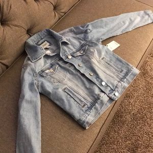Distressed blue jean jacket